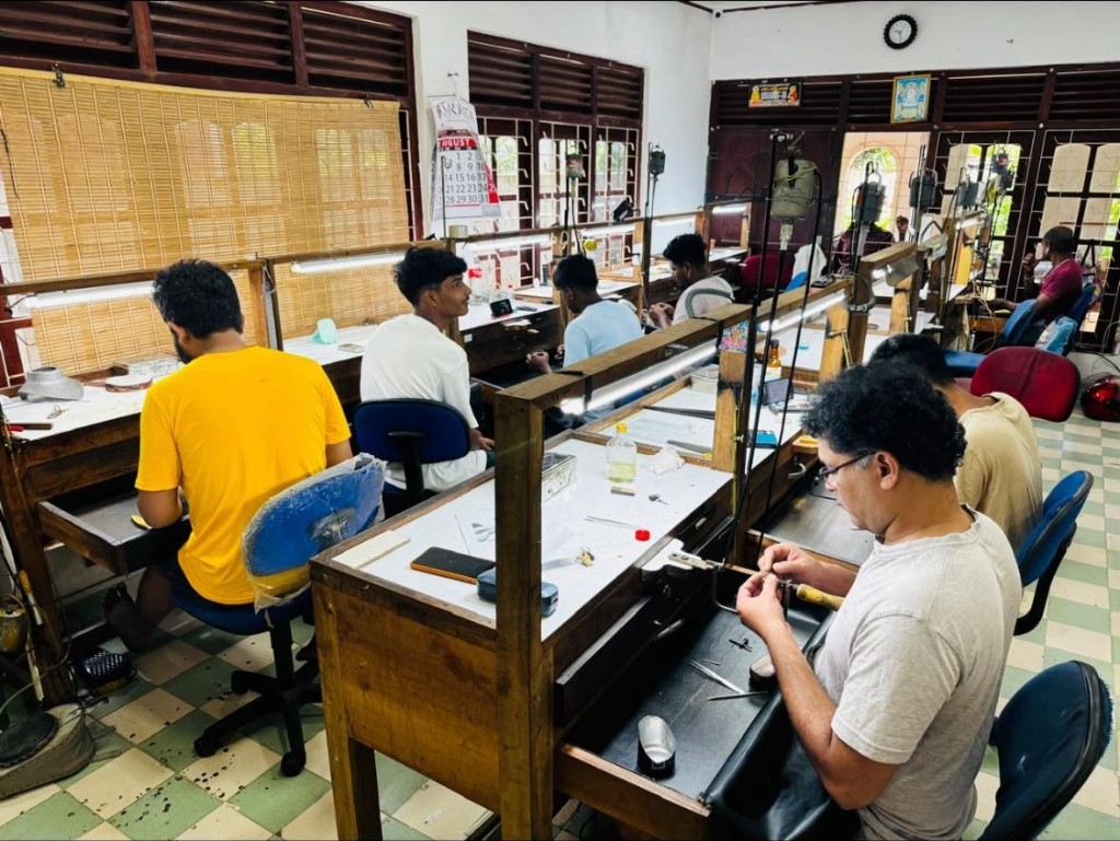 Sri Nadeesha craftsmen crafting jewellery at workstations in our manufacturing workshop